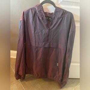 Pull over wind breaker with a hood